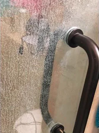 Shower glass before TouchShine cleaning